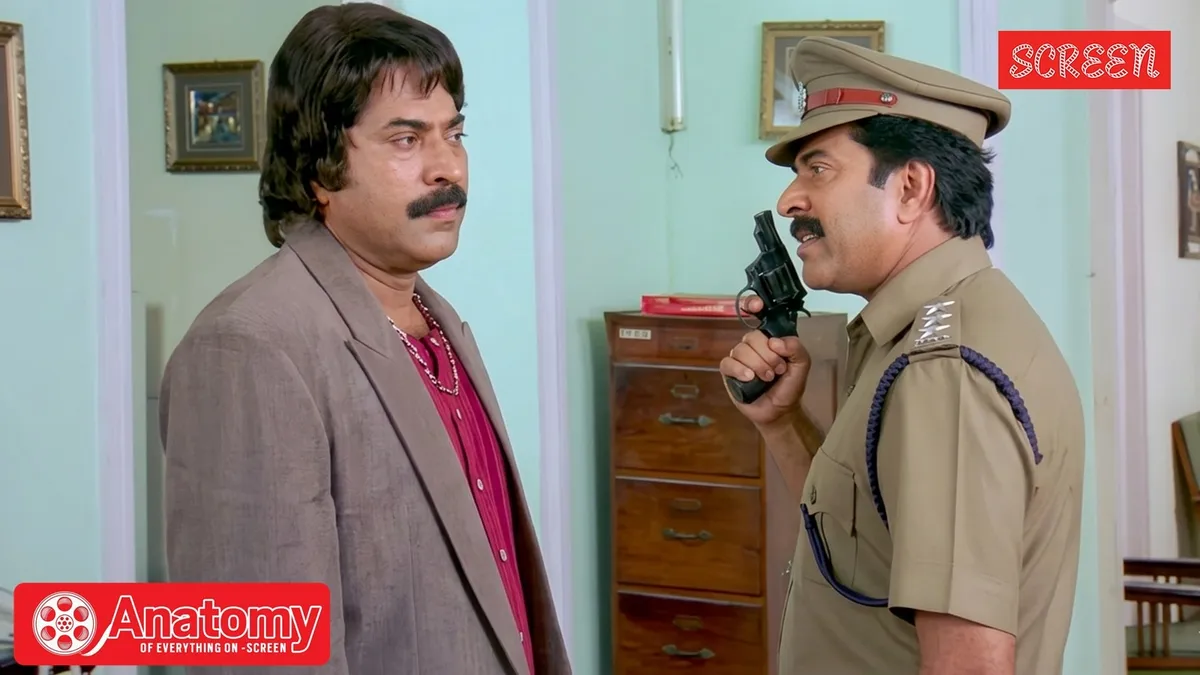 Mammootty in a still from a movie, looking intense.