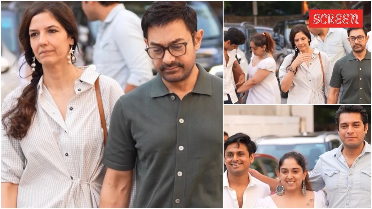 Aamir Khan and Gauri Spratt posing together at the 'Ek Din' premiere.