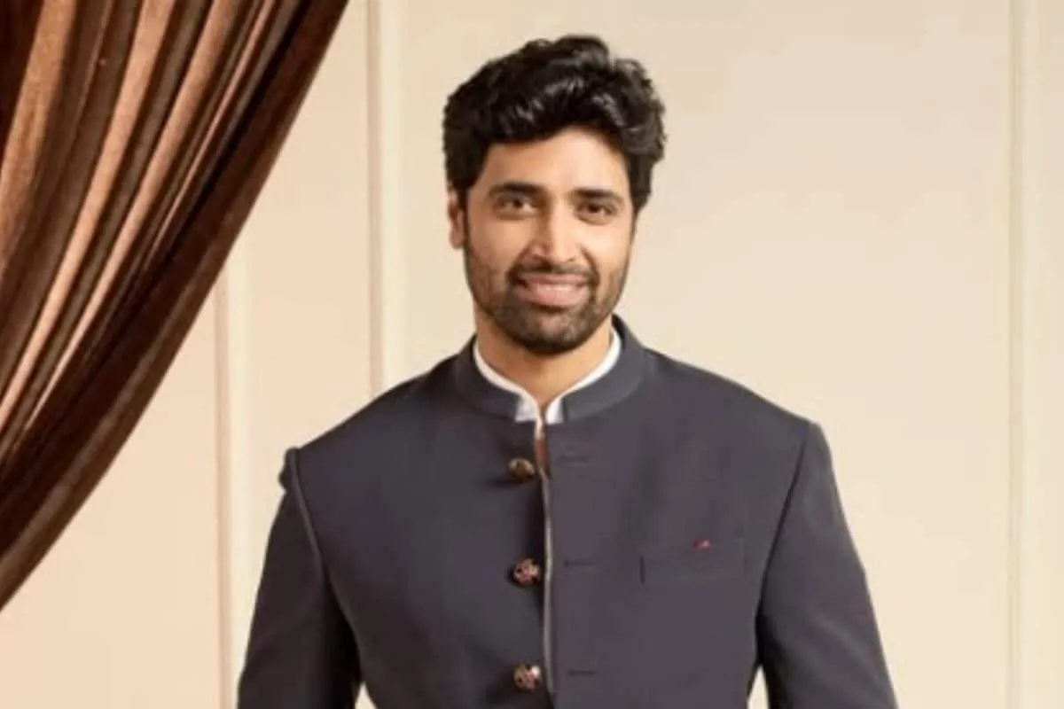 Adivi Sesh smiling during a recent interview for Dacoit promotions