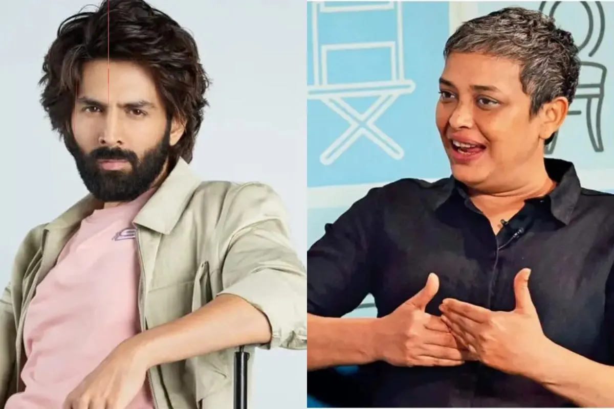 Kartik Aaryan in a movie scene, looking thoughtful.