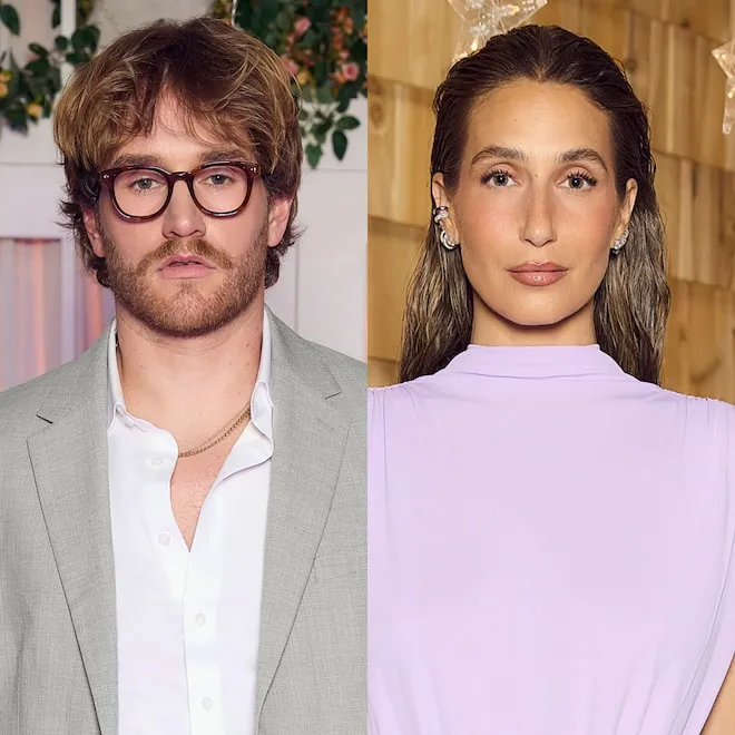 Amanda Batula and West Wilson smiling and holding hands at a baseball game.