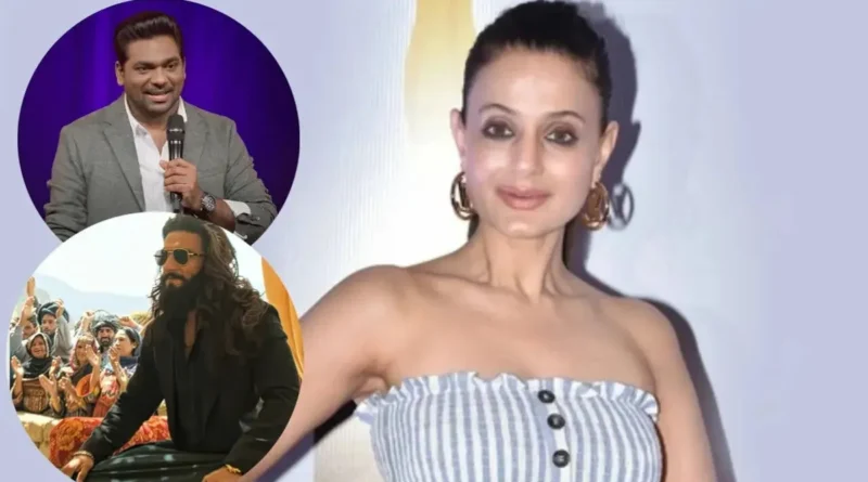 Ameesha Patel in a stylish outfit looking directly at the camera with confidence