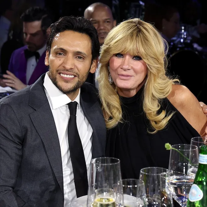 Sandra Lee smiling, possibly in a kitchen setting.