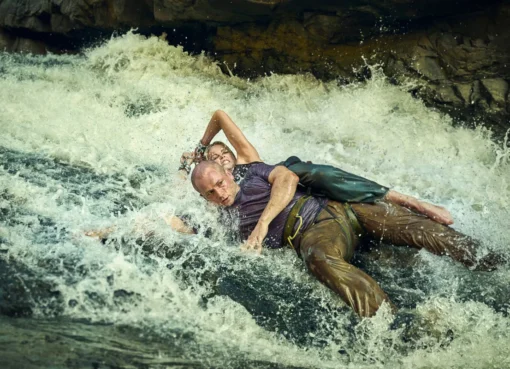 Charlize Theron as Sasha in the Australian Outback, looking intense and ready for a challenge.