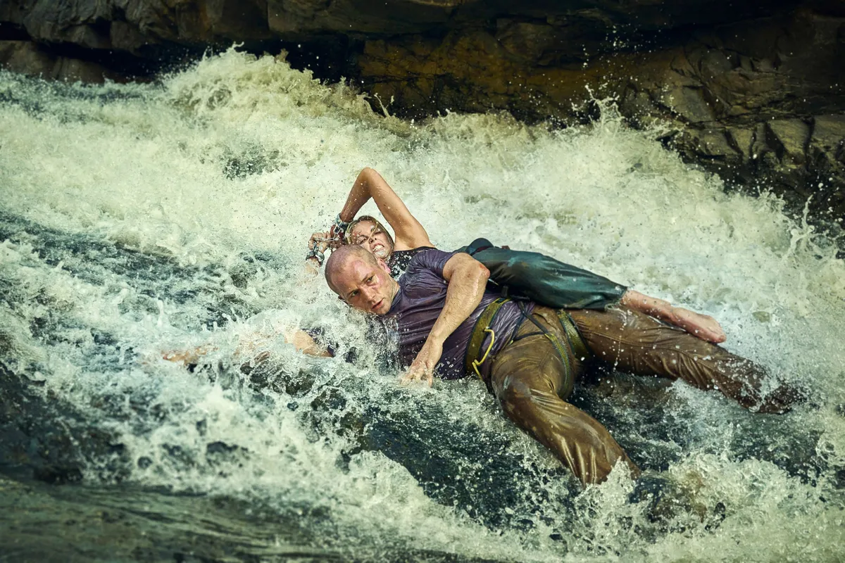 Charlize Theron as Sasha in the Australian Outback, looking intense and ready for a challenge.