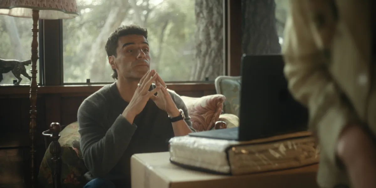 A still from the show Beef showing characters looking tense.