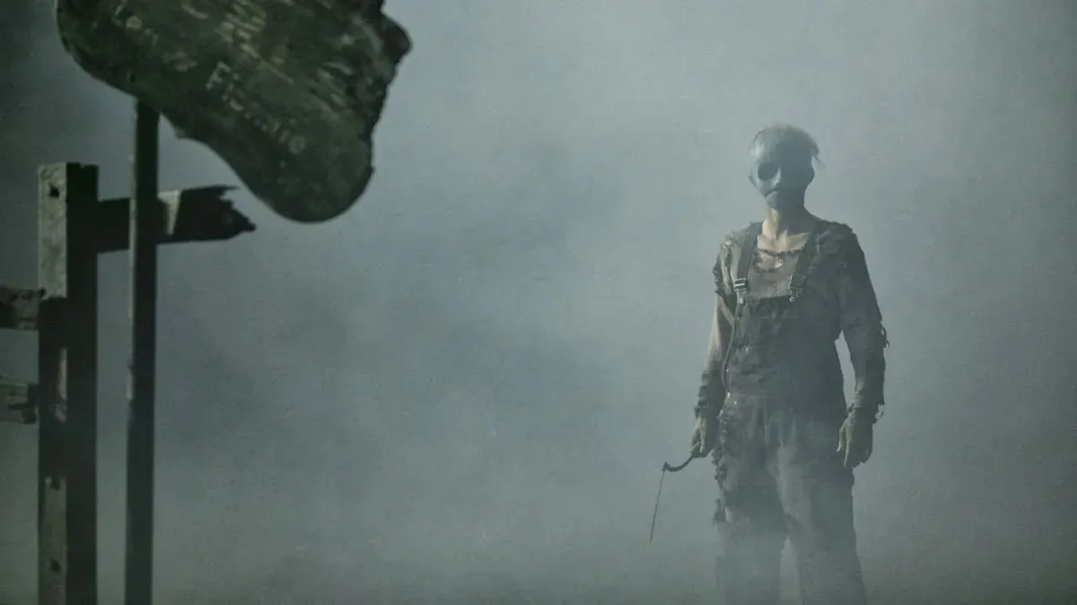 A shadowy figure with a mask, hinting at the return of Leslie Vernon.