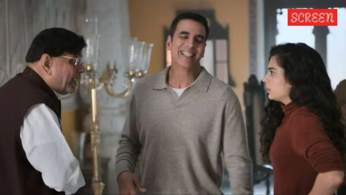 Akshay Kumar smiling on a movie poster