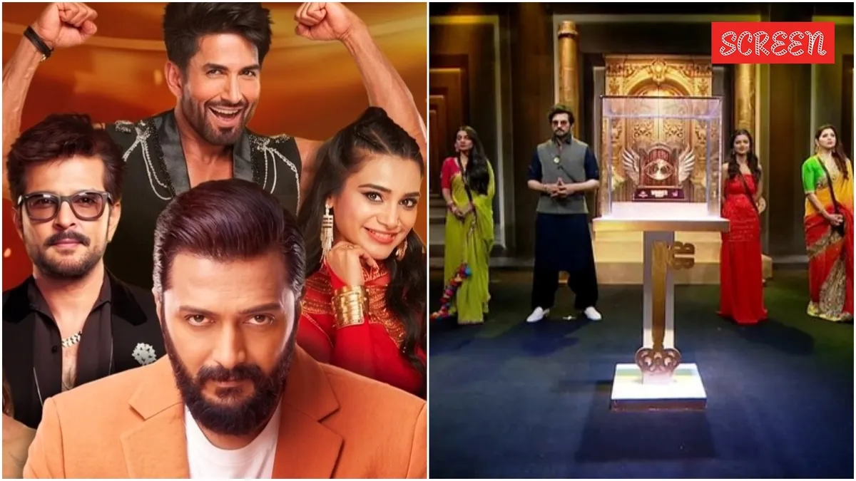 Riteish Deshmukh smiling on the Bigg Boss Marathi stage.