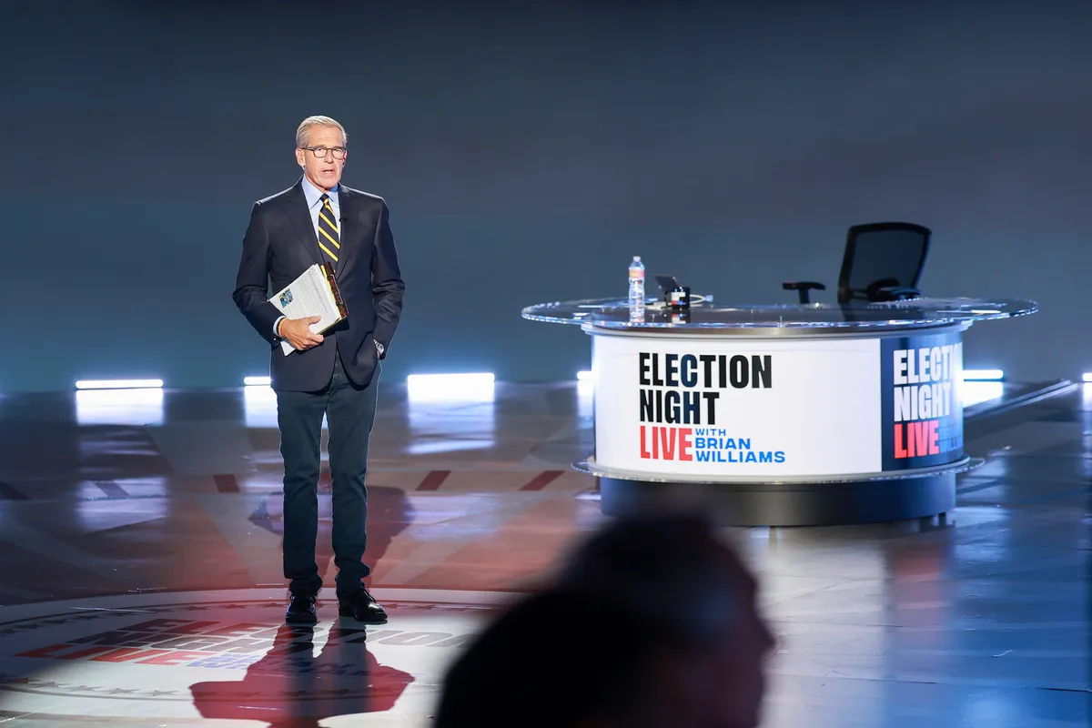 Photo of Brian Williams smiling.