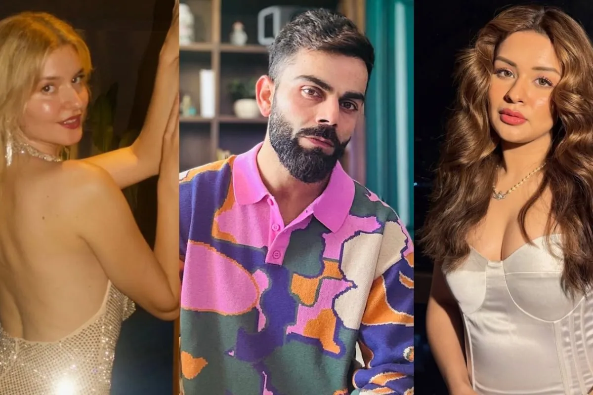 Virat Kohli looking surprised or confused while interacting with a smartphone.