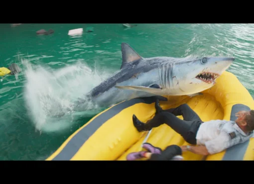 A plane crashing into a shark-infested ocean during a disaster movie.