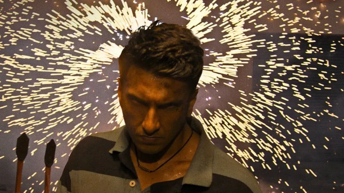 Movie poster for Dhurandhar 2, featuring Ranveer Singh in an action pose.