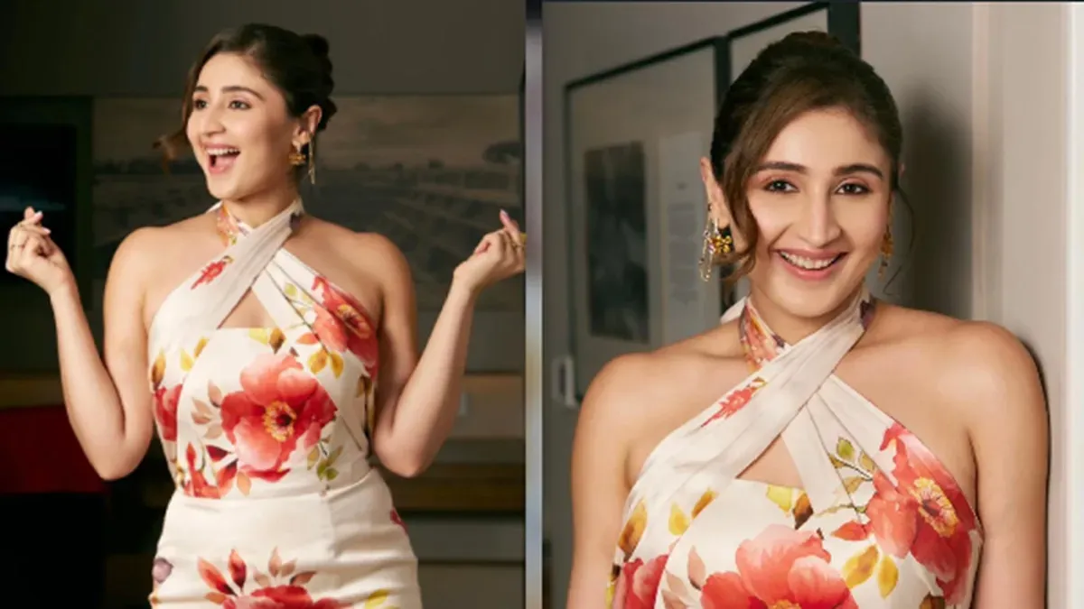 Dhvani Bhanushali performing on stage, dressed in a vibrant outfit, channeling BLACKPINK's 'Pink Venom' energy.