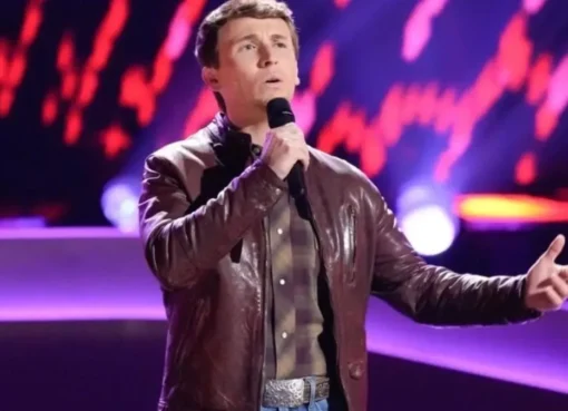 Dylan Carter smiling brightly during a performance.