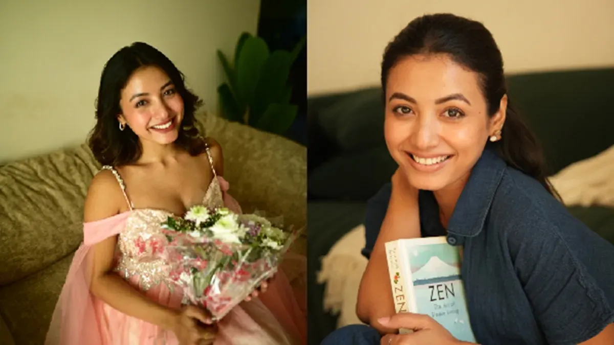 Surabhi Das smiling brightly, looking stylish in a candid interview moment.