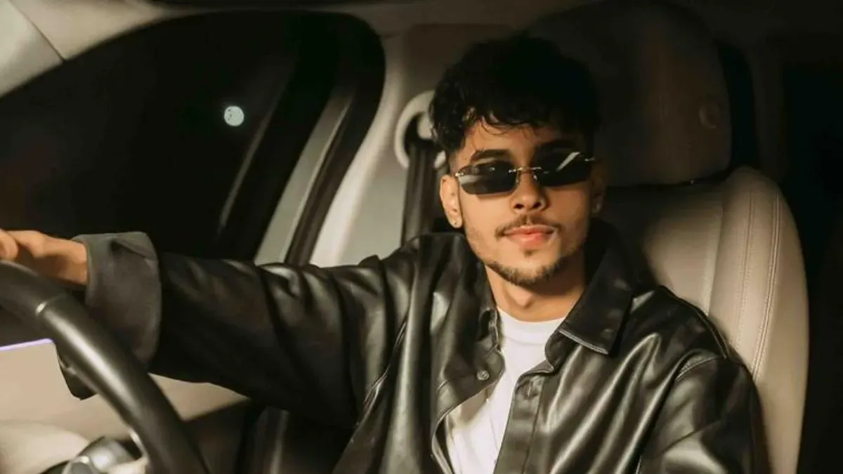 A vibrant photo of Ekam performing on stage.