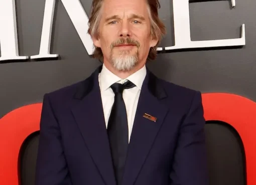 Ethan Hawke smiling with his daughter Maya Hawke and her husband Christian Lee Hutson
