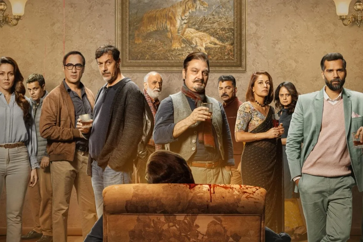 Vinay Pathak looking serious in a dimly lit room