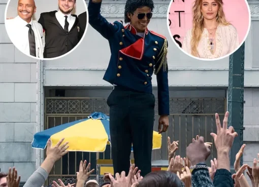 A still from the Michael Jackson movie showing him dancing on stage.