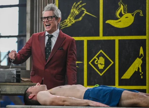 A dark and gritty stunt set from Fear Factor with neon lights.