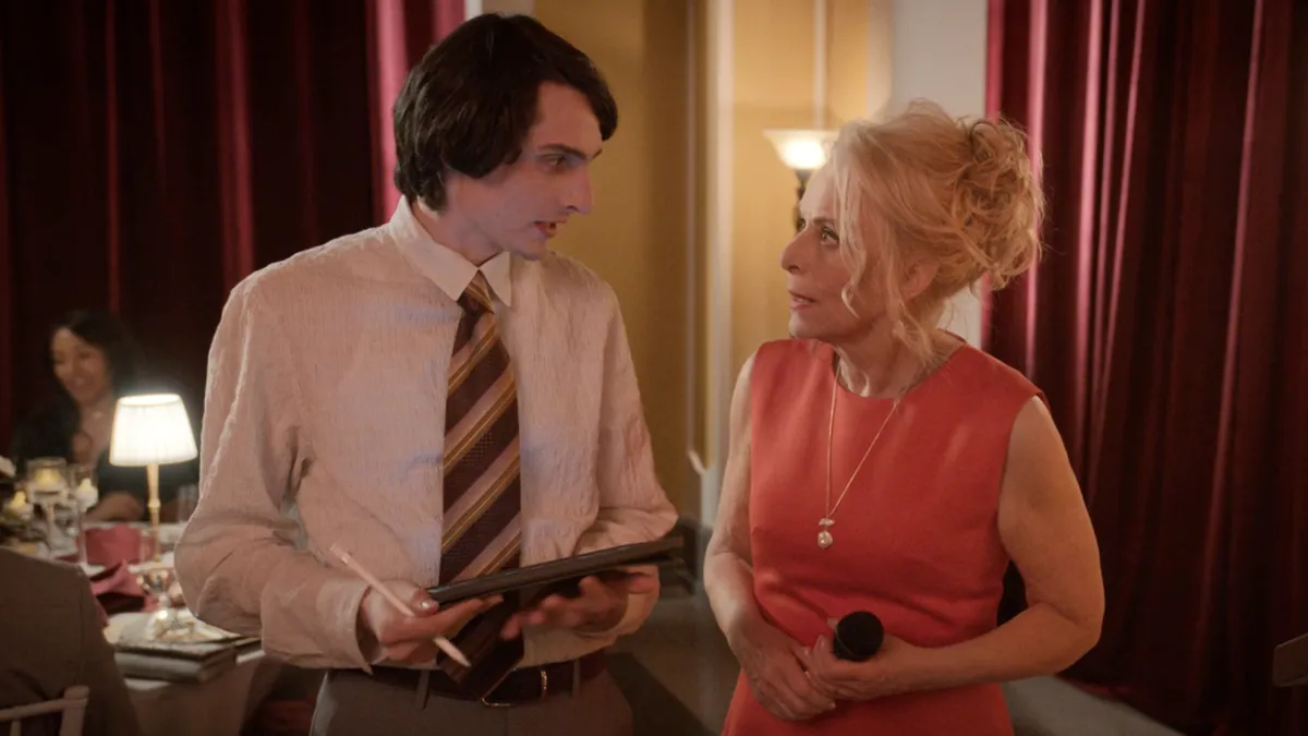 Finn Wolfhard looking excited at a movie premiere