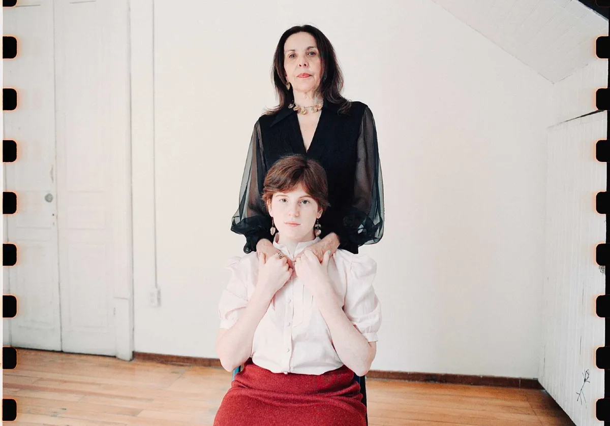 A vibrant film festival gathering with filmmakers discussing projects and collaborating.