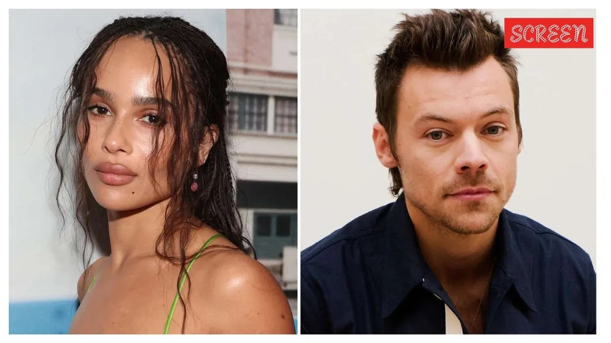 Harry Styles and Zoe Kravitz smiling and looking happy together.