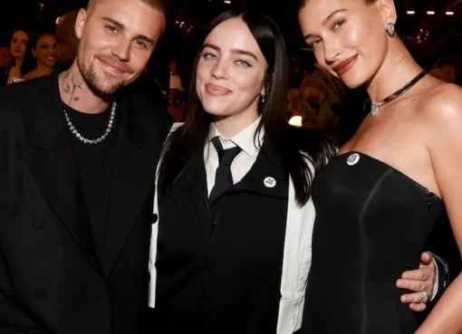 Billie Eilish and Justin Bieber performing together on a vibrant stage at Coachella.