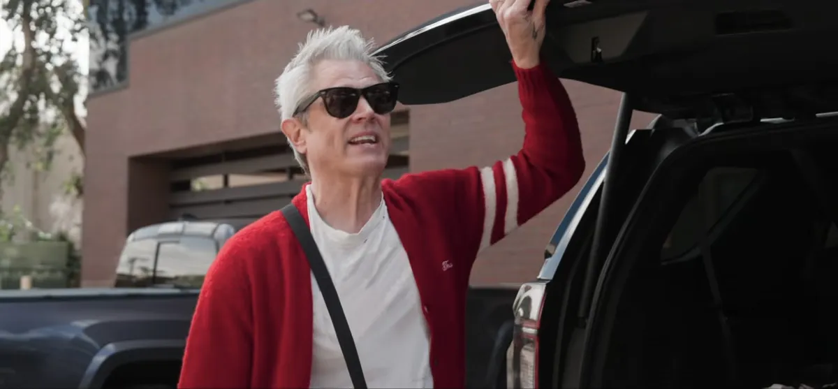 Johnny Knoxville with a mischievous grin, ready for a daring stunt in the Jackass: Best and Last trailer.