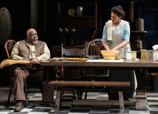 Actors on a Broadway stage.