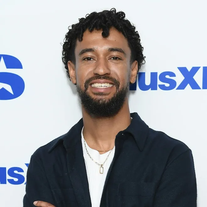 Anthony Norman looking surprised during a scene from Company Retreat