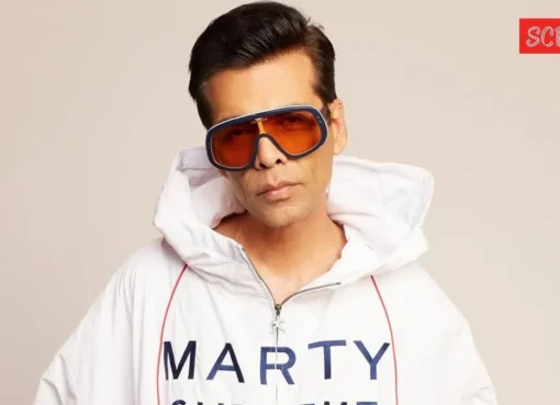 Karan Johar looking thoughtful, perhaps discussing Bollywood PR and the need for authenticity in the film industry.