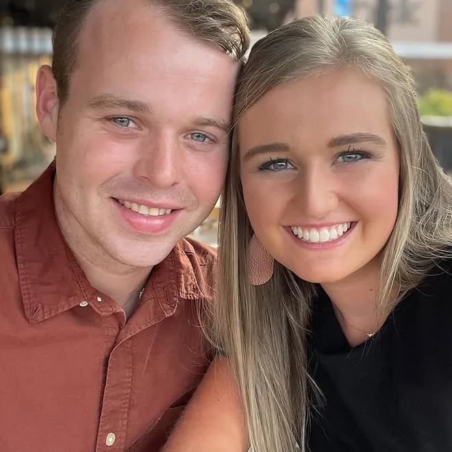 Joseph and Kendra Duggar posing together during a family event.