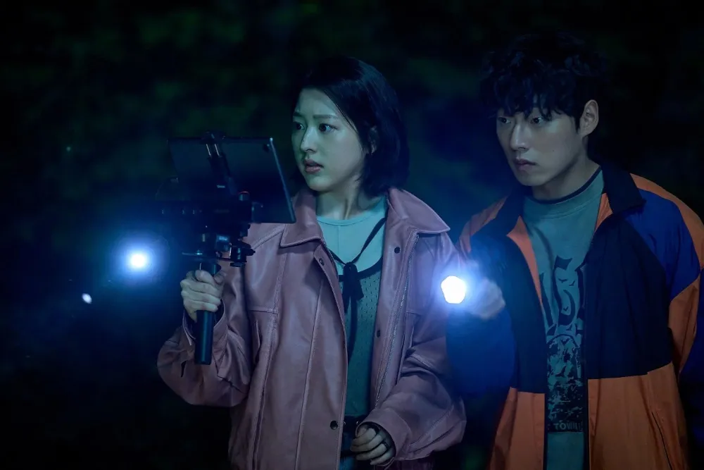 A dark, atmospheric movie poster for 'Salmokji: Whispering Water' showing eerie water and a mysterious figure.