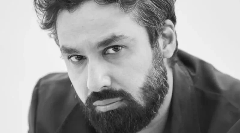 Kunal Nayyar smiling during an interview about his new app.