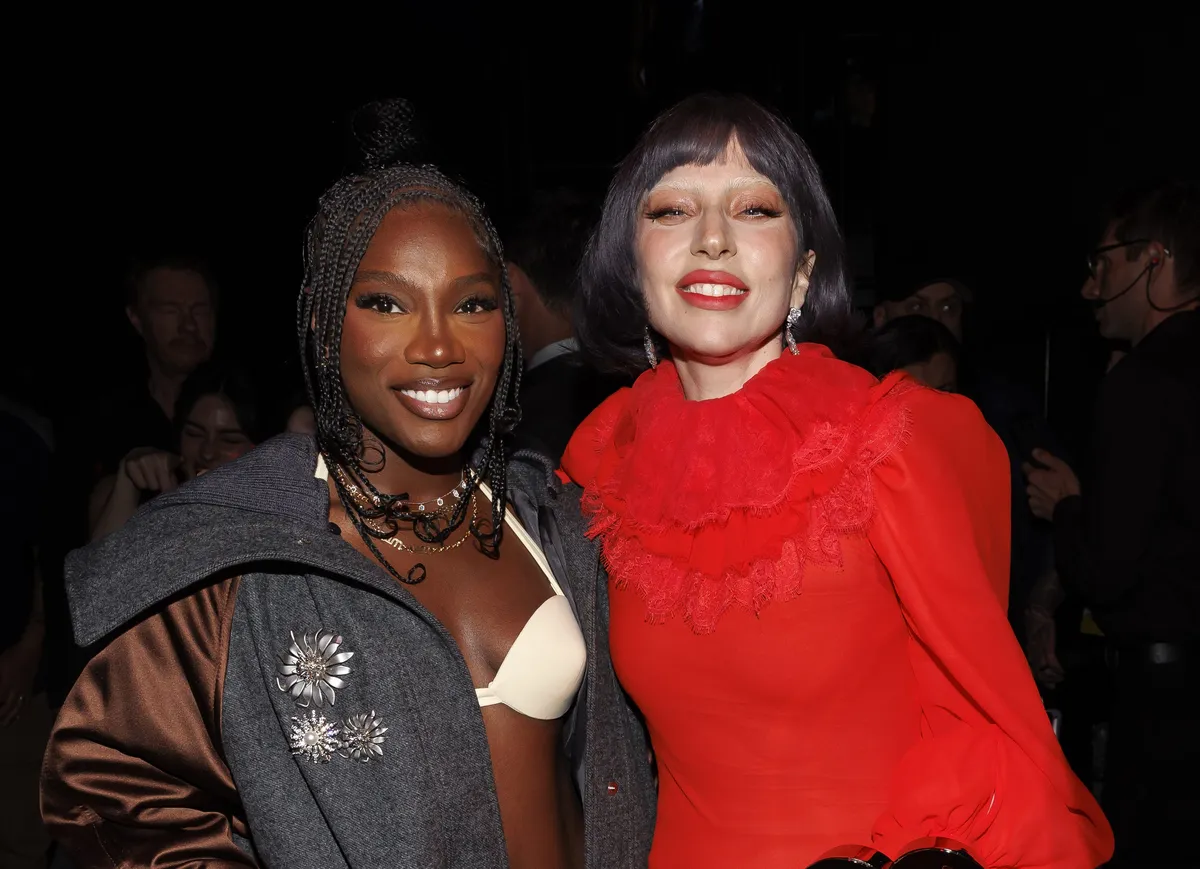 Lady Gaga and Doechii posing together.