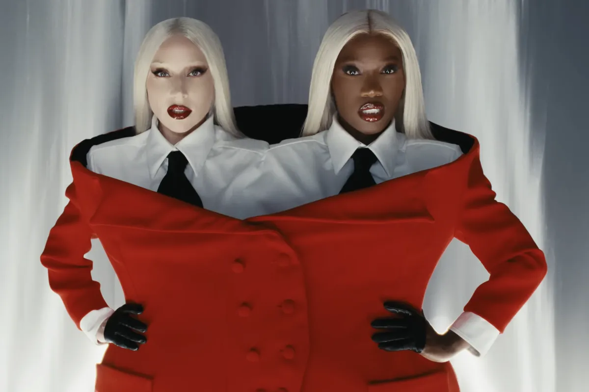 Lady Gaga and Doechii posing in high fashion outfits in the "Runway" music video.