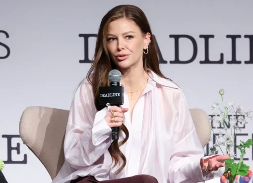 Ariana Madix smiling and looking confident at a public event, possibly Contenders TV.