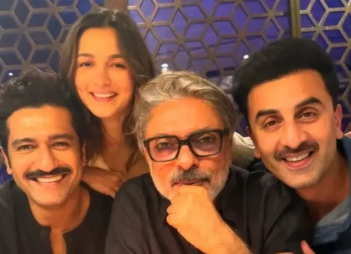 A graphic announcing Sanjay Leela Bhansali's 'Love & War' song shoot with Ranbir Kapoor, Vicky Kaushal, and Alia Bhatt.