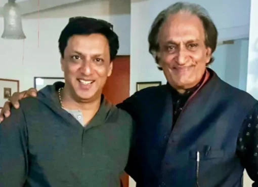 Filmmaker Madhur Bhandarkar in a thoughtful pose, speaking about Raghu Rai.