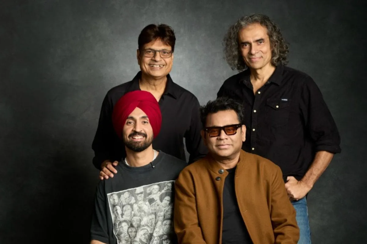 AR Rahman and Diljit Dosanjh on set, looking at a screen during the behind-the-scenes shoot for 'Kya Kamaal Hai' from 'Main Vaapas Aaunga'.