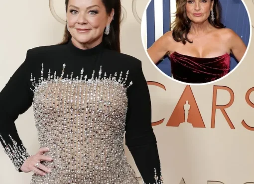 Melissa McCarthy sporting a shaggy mullet hairstyle.