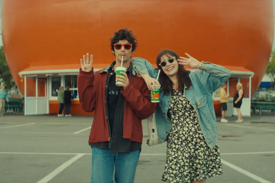 Barbie Ferreira looking thoughtful, perhaps holding a music review in an indie-rock setting.