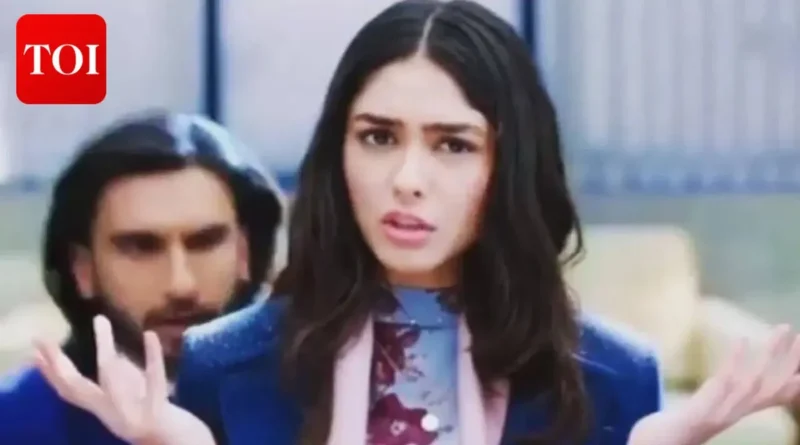 Ranveer Singh and Mrunal Thakur posing together during a promotional event