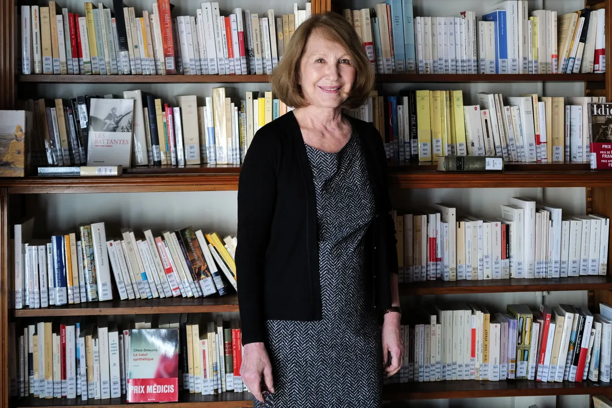 Nathalie Baye smiling gently.