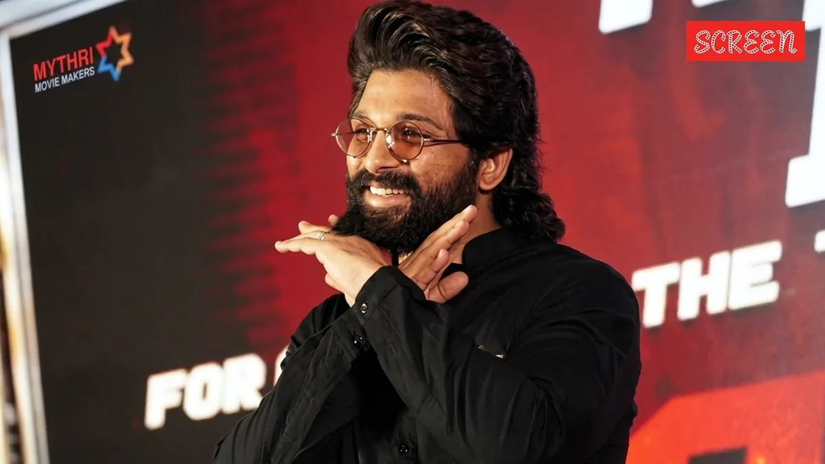 Allu Arjun smiling, looking confident.