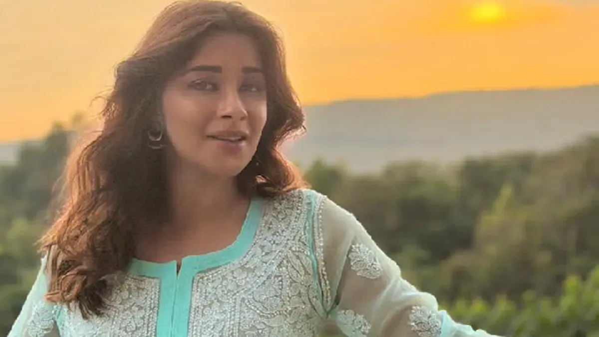 Nyrraa M Banerji smiling, ready for a tropical Bali vacation.