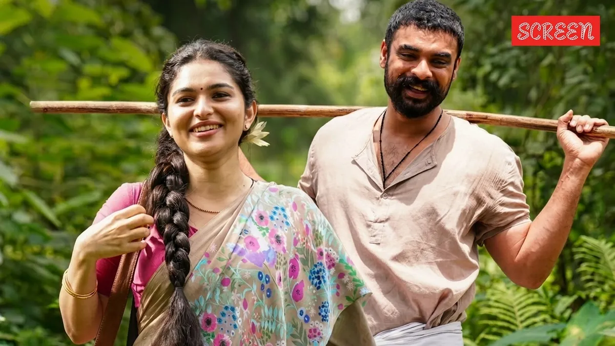 Tovino Thomas and Kayadu Lohar in a dramatic scene from the movie Pallichattambi.