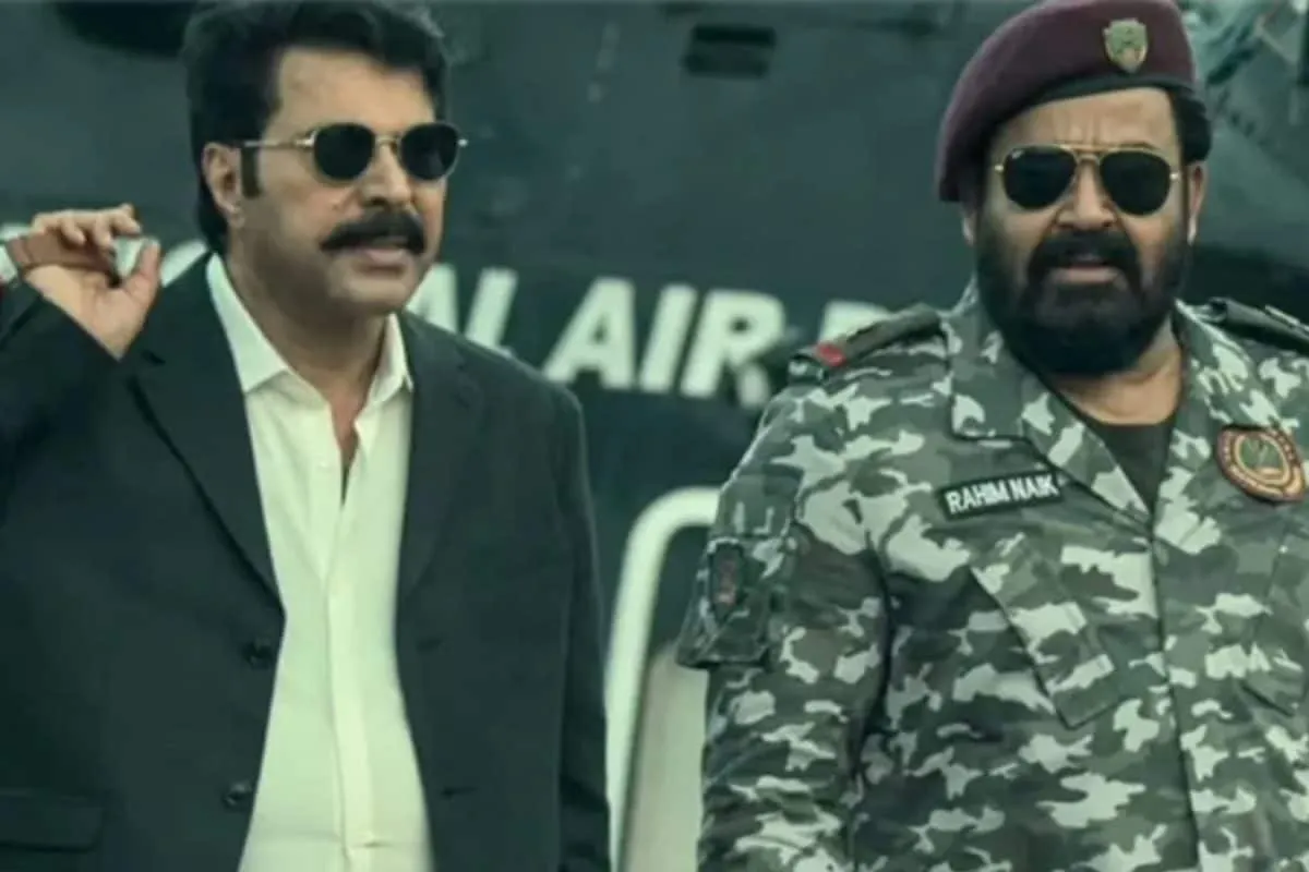 A movie poster for 'Patriot' featuring Mohanlal and Mammootty.